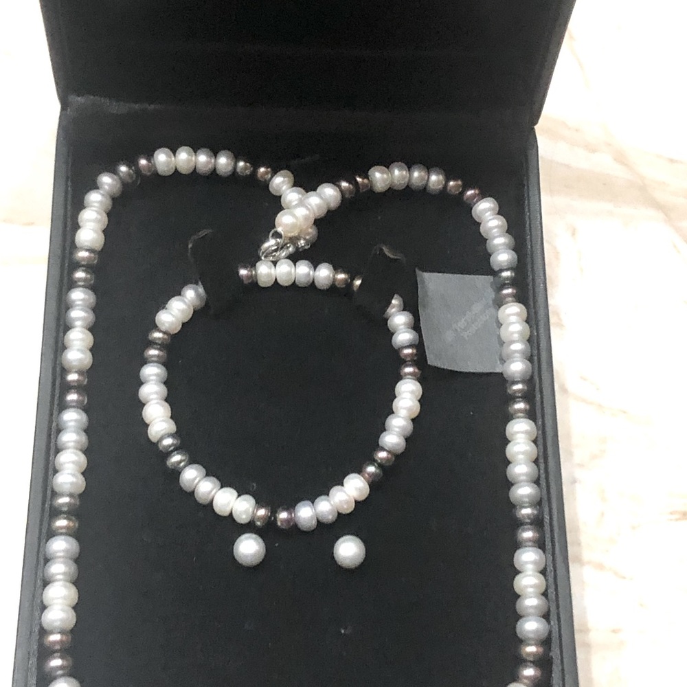 This set is beautiful and never worn.  In original box.